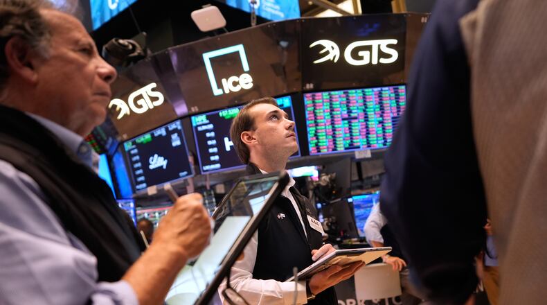 Traders work on the floor at the New York Stock Exchange in New York, Wednesday, Sept. 16, 2026. (AP Photo/Seth Wenig)