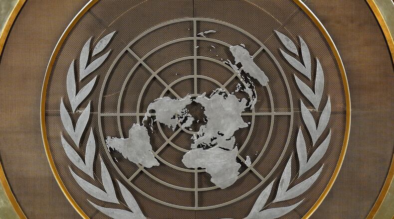 FILE - The United Nations logo is seen inside the 79th session of the United Nations General Assembly, Tuesday, Sept. 24, 2024. (AP Photo/Pamela Smith, File)