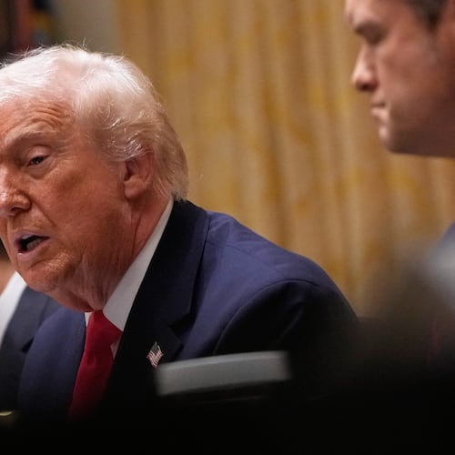 President Donald Trump speaks during a Cabinet meeting at the White House, Tuesday, Dec. 2, 2025, in Washington, with Secretary of State Marco Rubio, seated left and Defense Secretary Pete Hegseth, seated left. (AP Photo/Julia Demaree Nikhinson)