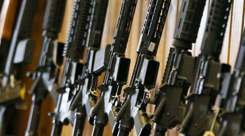 Semi-automatic AR-15s, the type of gun that was used last week in the Marjory Stoneman Douglas High School shooting in Parkland, Fla. (Photo by George Frey/Getty Images)