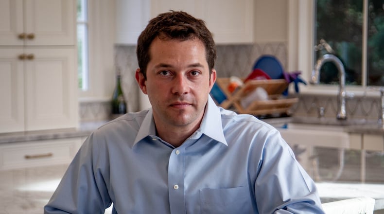 Dr. Jeffrey Siegelman, an emergency physician, poses for a photograph in his Atlanta home on March 9, 2021. STEVE SCHAEFER FOR THE ATLANTA JOURNAL-CONSTITUTION