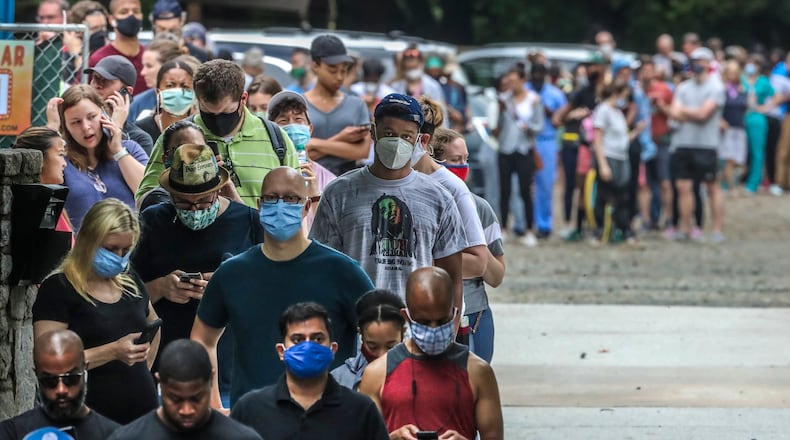 Voters had a long wait, some two to three hours, at the Park Tavern polling place on June 9, 2020, in Atlanta. (John Spink/Atlanta Journal-Constitution/TNS)