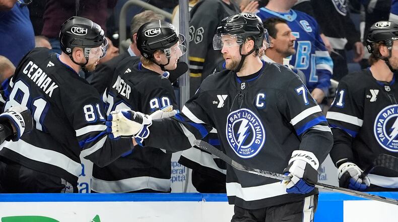 FILE - Tampa Bay Lightning defenseman Victor Hedman, front, celebrates with the bench after scoring against the Buffalo Sabres during the third period of an NHL hockey game Saturday, Feb. 28, 2026, in Tampa, Fla. (AP Photo/Chris O'Meara, File)