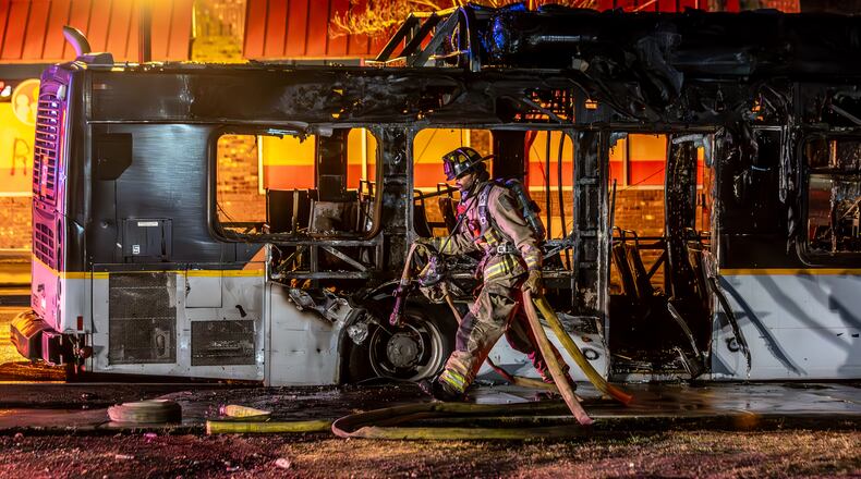 Atlanta fire crews worked the scene of a fire that gutted a MARTA bus in southwest Atlanta on Monday morning, March 11, 2024.