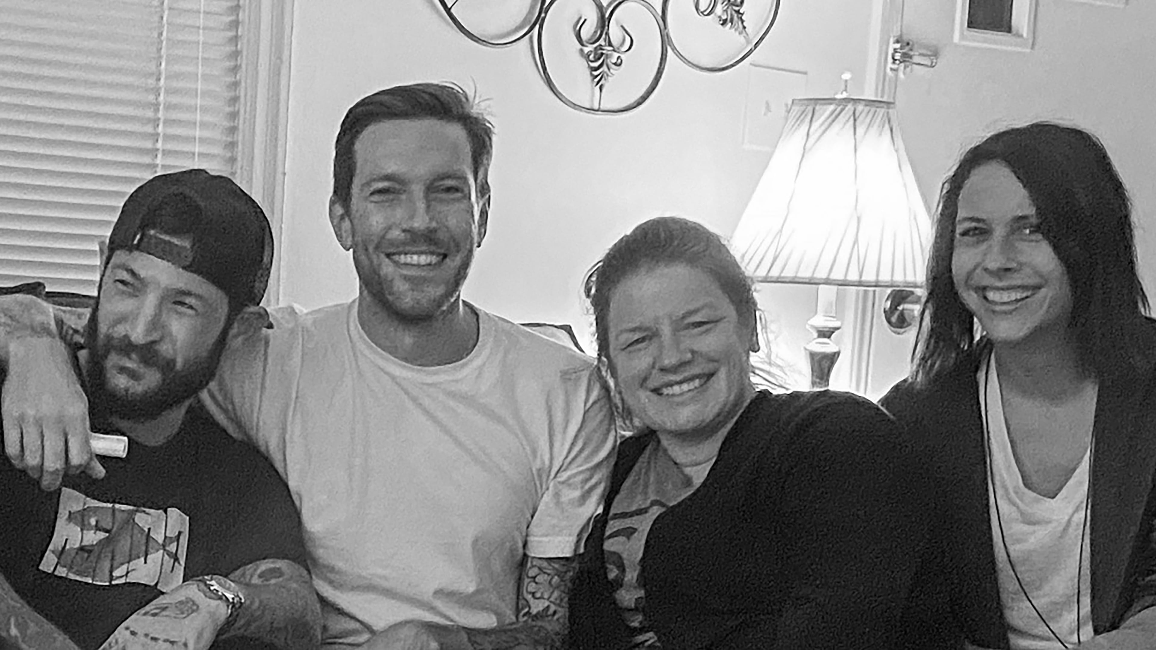 Four of the five authors of "Young Firecrackers": Ryan Bernstein (from left), Brian Rehn, Brooke Graham and Ashley Mercurio. The authors all graduated from Pope High School in Marietta in the late '90s and early 2000s. (Courtesy of Brian Rehn)