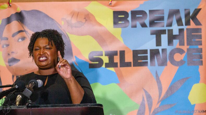 Democrat Stacey Abrams has filed a lawsuit in federal court asking that she be allowed to set up a "leadership committee" under a state law that permits the governor, the opposing party's nominee and party caucuses to raise unlimited amounts of campaign cash without limits on donors. Gov. Brian Kemp has been able to use such a committee to raise at least $2.3 million since June. STEVE SCHAEFER FOR THE ATLANTA JOURNAL-CONSTITUTION