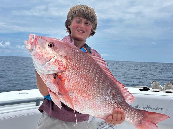 Hudson Kent of Statesboro shows off his catch of red snapper during Georgia's one-day recreational fishing season in 2024.