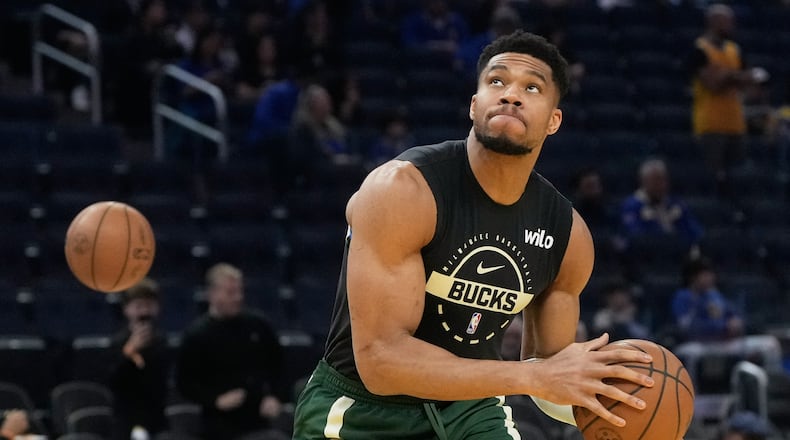 FILE - Milwaukee Bucks forward Giannis Antetokounmpo warms up before an NBA basketball game against the Golden State Warriors in San Francisco, Jan. 7, 2026. (AP Photo/Jeff Chiu, File)