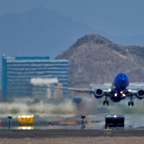 FILE - A jet takes flight as heat ripples radiate from the runway at Sky Harbor International Airport in Phoenix, on July 25, 2023. (AP Photo/Matt York, File)