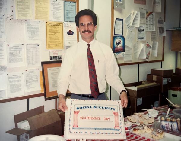 This photo provided by Dennis Purifoy on Wednesday, April 9, 2025, shows Purifoy in 1995 at the Social Security office where he worked in the Alfred P. Murrah Federal Building in Oklahoma City. (Dennis Purifoy via AP)