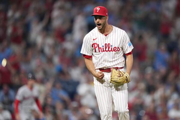 Philadelphia Phillies pitcher Max Lazar reacts after striking out Boston Red Sox's Roman Anthony during the 10th inning of a baseball game Monday, July 21, 2025, in Philadelphia. (AP Photo/Matt Slocum)