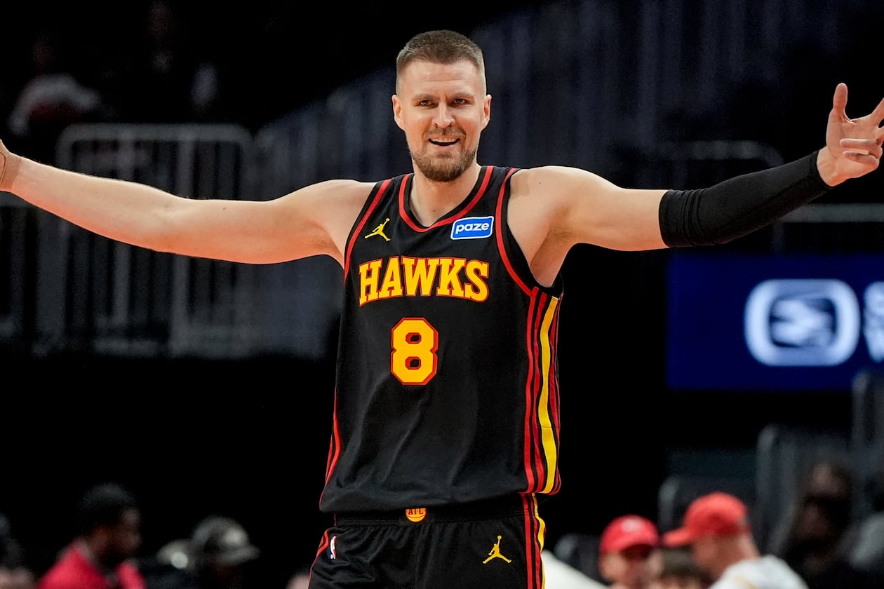 Center Kristaps Porzingis — pictured celebrating during the Hawks' win over the Raptors on Nov. 7 — finished with 13 points and six assists in Atlanta's 133-100 win over Sacramento on Wednesday, Nov. 12, 2025. The Hawks have a three-game winning streak, their longest of the season. (Mike Stewart/AP)