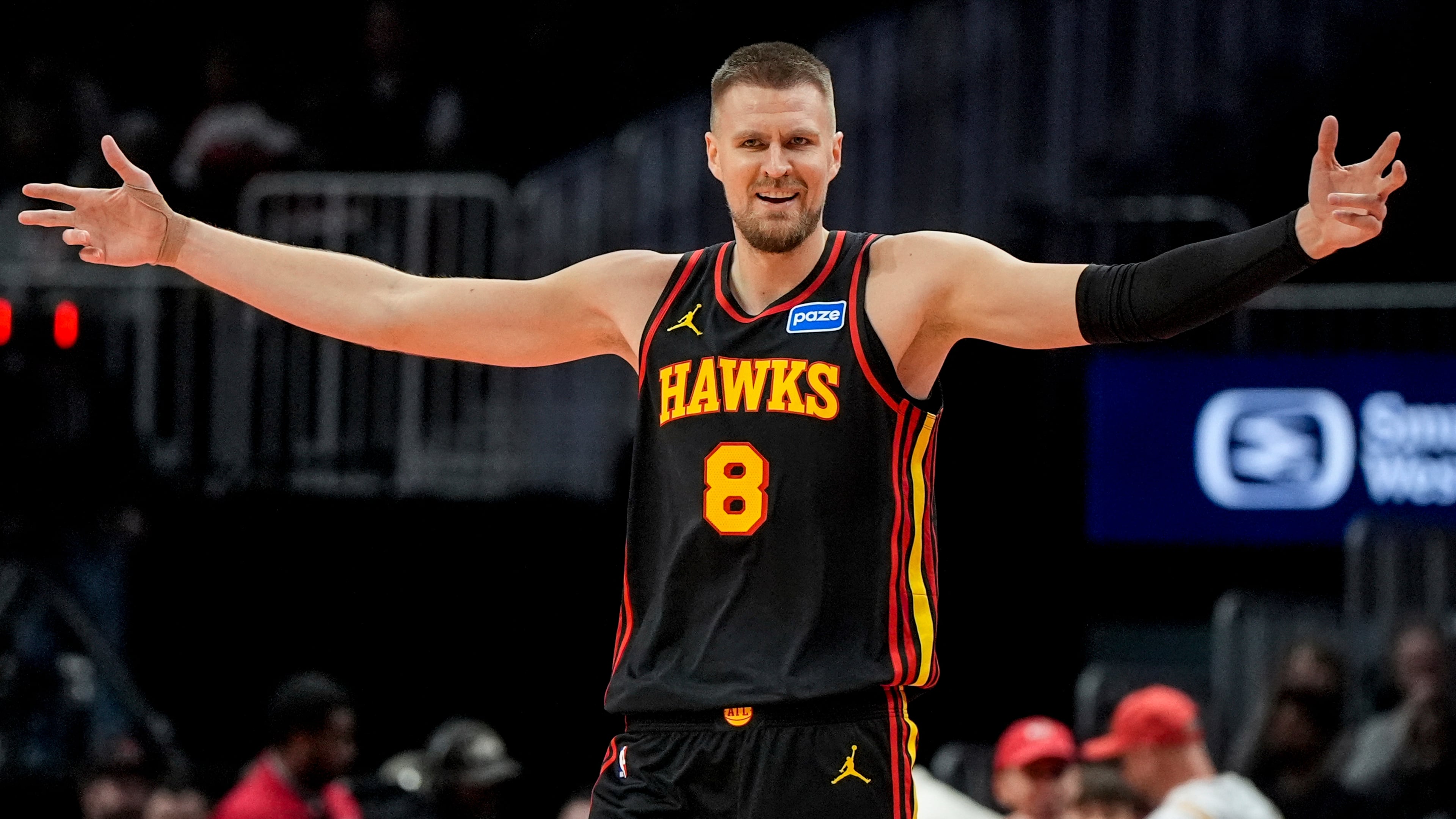 Center Kristaps Porzingis — pictured celebrating during the Hawks' win over the Raptors on Nov. 7 — finished with 13 points and six assists in Atlanta's 133-100 win over Sacramento on Wednesday, Nov. 12, 2025. The Hawks have a three-game winning streak, their longest of the season. (Mike Stewart/AP)