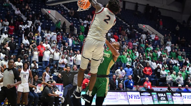 March 11, 2022 Macon - Grovetown's Frankquon Sherman (2) dunks the ball at the end of the 4th quarter during the 2022 GHSA State Basketball Class AAAAAA Boys Championship game at the Macon Centreplex in Macon on Friday, March 11, 2022. Grovetown won 66-59 over Buford. (Hyosub Shin / Hyosub.Shin@ajc.com)