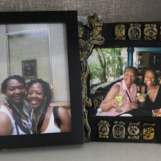 Shelves are lined with photos and memories of Shalon Irving in her home in Sandy Springs. Irving died in 2017 shortly after giving birth. Wanda Irving, her mother, is raising her daughter, Soleil. (Emily Haney/AJC)