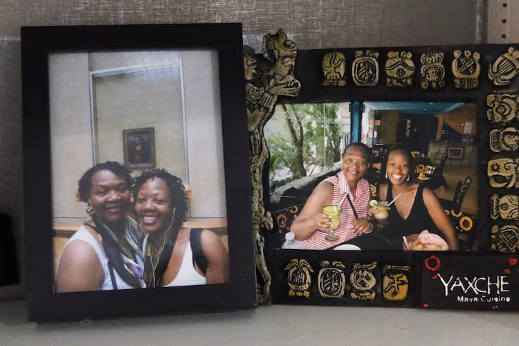 Shelves are lined with photos and memories of Shalon Irving in her home in Sandy Springs. Irving died in 2017 shortly after giving birth. Wanda Irving, her mother, is raising her daughter, Soleil. (Emily Haney/AJC)
