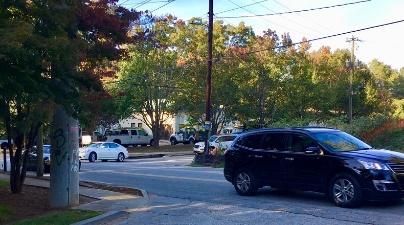 This intersection has already received two new stop signs on South Columbia Drive (center, with cars moving left to right). But eventually it will get entirely revamped with features including a split-phase traffic signal controlling the approaches on Shadowmoor Drive (foreground), Columbia and Talley Street (white car turning left). Bill Banks file photo for the AJC