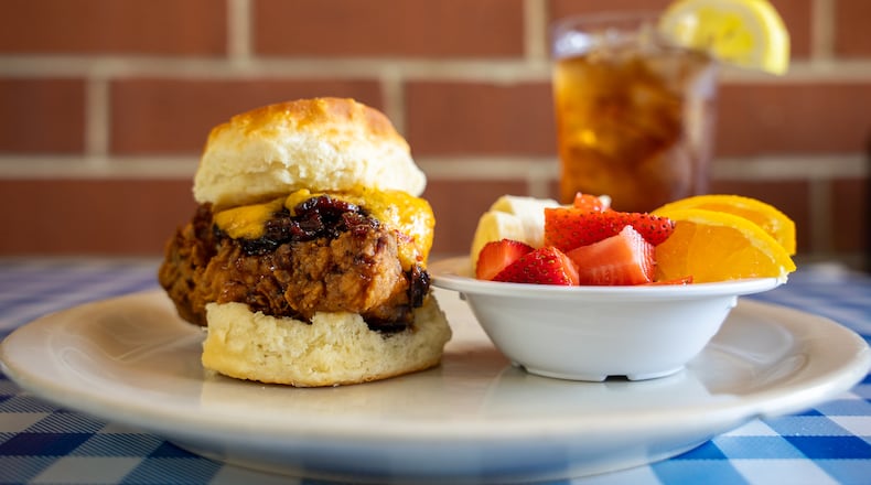 The Midnight Rider at H&H Restaurant consists of a fried chicken breast served in a biscuit with house-made pimento cheese and bacon jam. Courtesy of Visit Macon