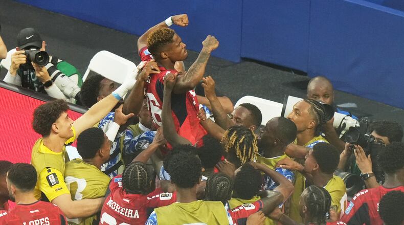 Cape Verde's Helio Varela, top, celebrates scoring his side's second goal against Uruguay during the World Cup Group H soccer match in Miami Gardens, Fla., Sunday, June 21, 2026. (AP Photo/Marta Lavandier)