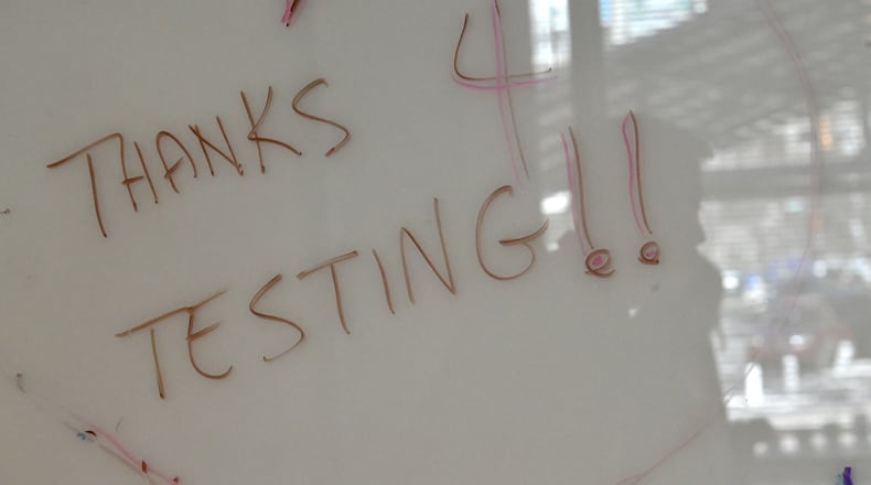 In this file photo from January, Georgia Tech students and employees get tested for COVID-19 at Georgia Tech’s Economic Development Building. (Hyosub Shin / Hyosub.Shin@ajc.com)
