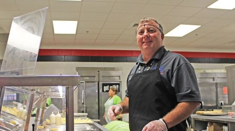 Rockdale County Public Schools celebrated National School Lunch Week Oct. 10-14 with the theme  Show Your School Spirit.  This week highlighted the importance of healthy school meals and the work of school nutrition employees who feed and care for the children. RCPS serves more than 4 million meals a year, including lunches, breakfasts, snacks and summer lunches. On Oct. 14 special guest servers volunteered in school cafeterias, including RCPS Superintendent Richard Autry at Hightower Trail Elementary, (pictured) Conyers Police Department Capt. Derek Parker at Conyers Middle and Rockdale County Tax Commissioner RJ Hadley at Conyers Middle.