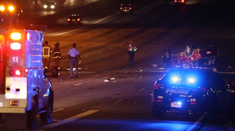 Authorities investigate a deadly wreck on I-85 in Atlanta on Monday night. (BEN GRAY / BGRAY@AJC.COM)