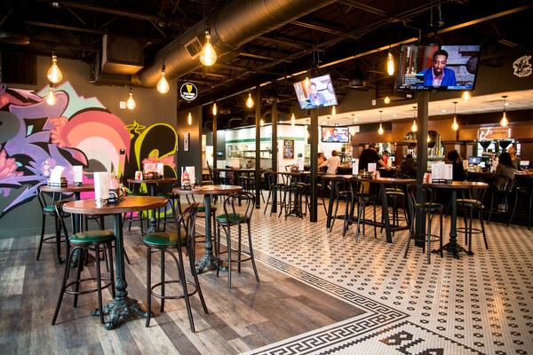 Black Sheep Tavern and Oyster Room dining area and bar. Photo credit- Mia Yakel.