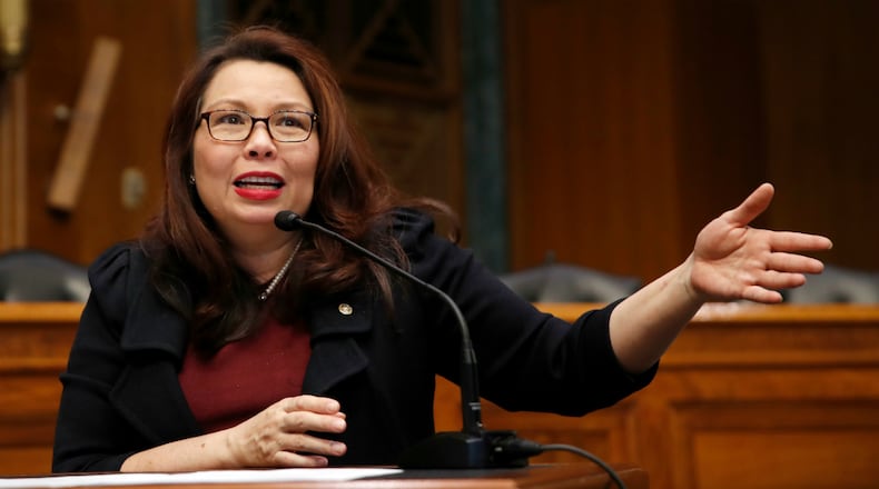 In this Feb. 14, 2018, file photo, Sen. Tammy Duckworth, D-Ill., speaks on Capitol Hill, in Washington. Duckworth has given birth to a baby girl, making her the first U.S. senator to give birth while in office. The Illinois Democrat announced she delivered her second daughter, Maile Pearl Bowlsbey, on Monday, April 9, 2018.