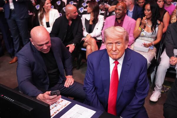President Donald Trump attends the UFC-316 mixed martial arts event, at the Prudential Center, Saturday, June 7, 2025, in Newark, N.J., with UFC's Dana White, left. (AP Photo/Frank Franklin II)