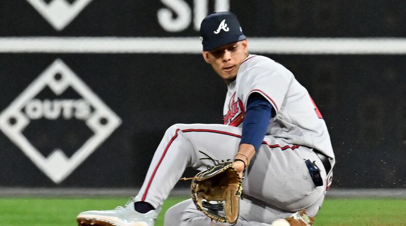 Atlanta Braves second baseman Vaughn Grissom (18) fields a grounder by Philadelphia Phillies’ Alec Bohm during the fifth inning of game three of the National League Division Series at Citizens Bank Park in Philadelphia on Friday, October 14, 2022. (Hyosub Shin / Hyosub.Shin@ajc.com)