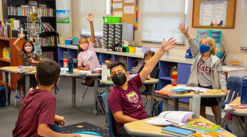 Students of Drake Dalton's fourth-grade class participate in a group discussion at the Walker School in Marietta Friday, August 20, 2021. STEVE SCHAEFER FOR THE ATLANTA JOURNAL-CONSTITUTION