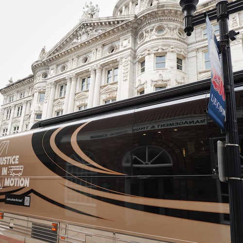 A tour bus carrying retired judges on a tour through the Rust Belt to defend judicial independence is parted outside the Westmoreland County Courthouse in Greensburg, Pa., on Tuesday, July 7, 2026. (Keep Our Republic via AP)