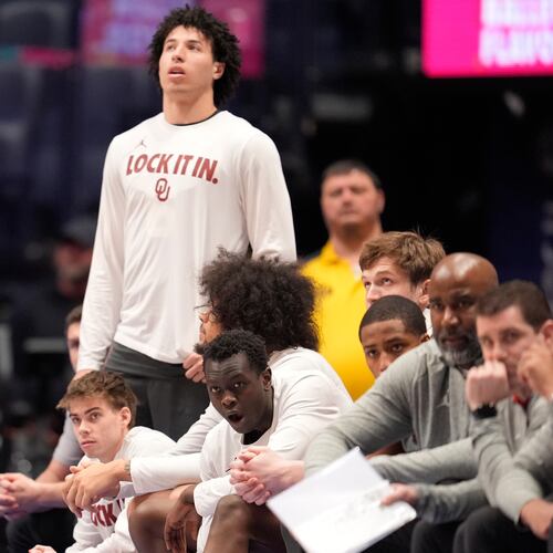 The Oklahoma bench watches play against Arkansas during the second half of an NCAA college basketball game in the quarterfinal round of the Southeastern Conference tournament, Friday, March 13, 2026, in Nashville, Tenn. (AP Photo/George Walker IV)