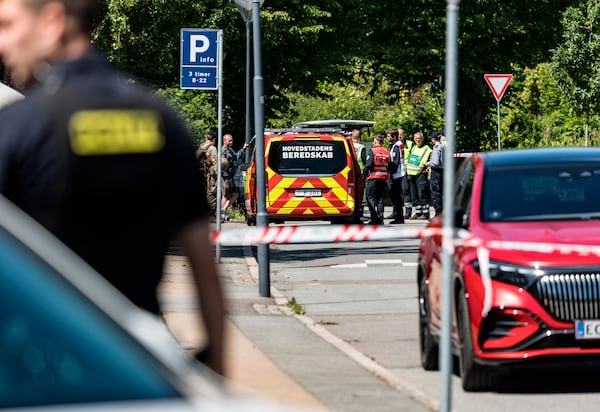 Danish Police and ambulance at Norgesmindevej in Hellerup, Copenhagen, Denmark, Thursday July 3, 2025, near the Israeli embassy to examine a suspicious package. (Steven Knap/Ritzau Scanpix via AP)