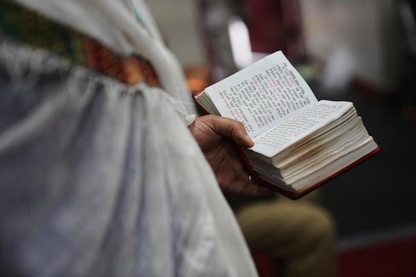 Congregants attend an hours-long service at Re'ese Adbarat Debre Selam Kidist Mariam Church, an Ethiopian Orthodox Tewahedo church, in Washington, D.C., Saturday, April 5, 2025. (AP Photo/Jessie Wardarski)