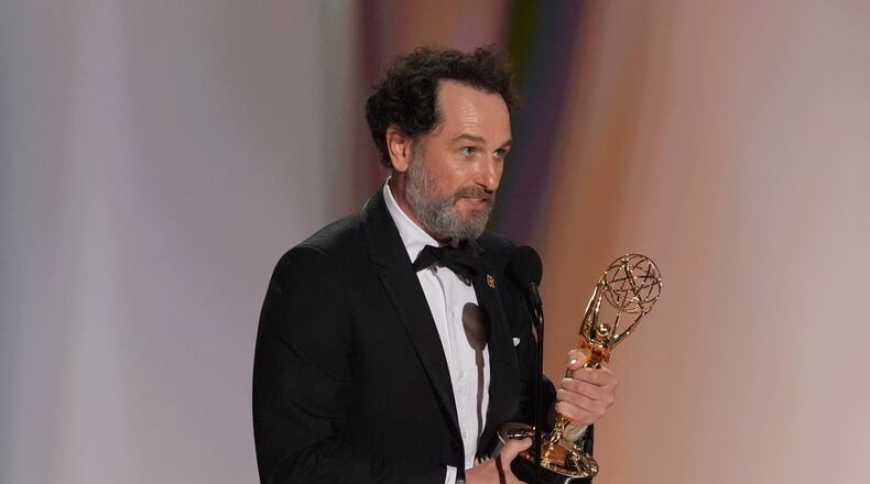 Matthew Rhys accepts the award for outstanding lead actor in a limited or anthology series or movie for "The Beast In Me" during the 78th Emmy Awards on Monday, Sept. 14, 2026, at the Peacock Theater in Los Angeles. (AP Photo/Chris Pizzello)