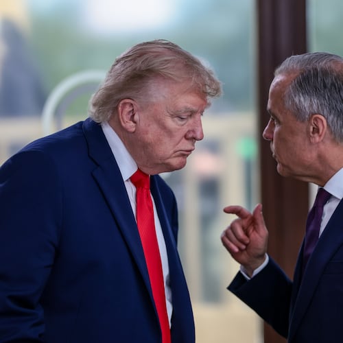 FILE - President Donald Trump speaks with Canadian Prime Minister Mark Carney, right, at a working lunch with leaders of G7 and the Middle East in Evian-les-Bains, France, Tuesday, June 16, 2026. (Evelyn Hockstein/Pool Photo via AP,File)
