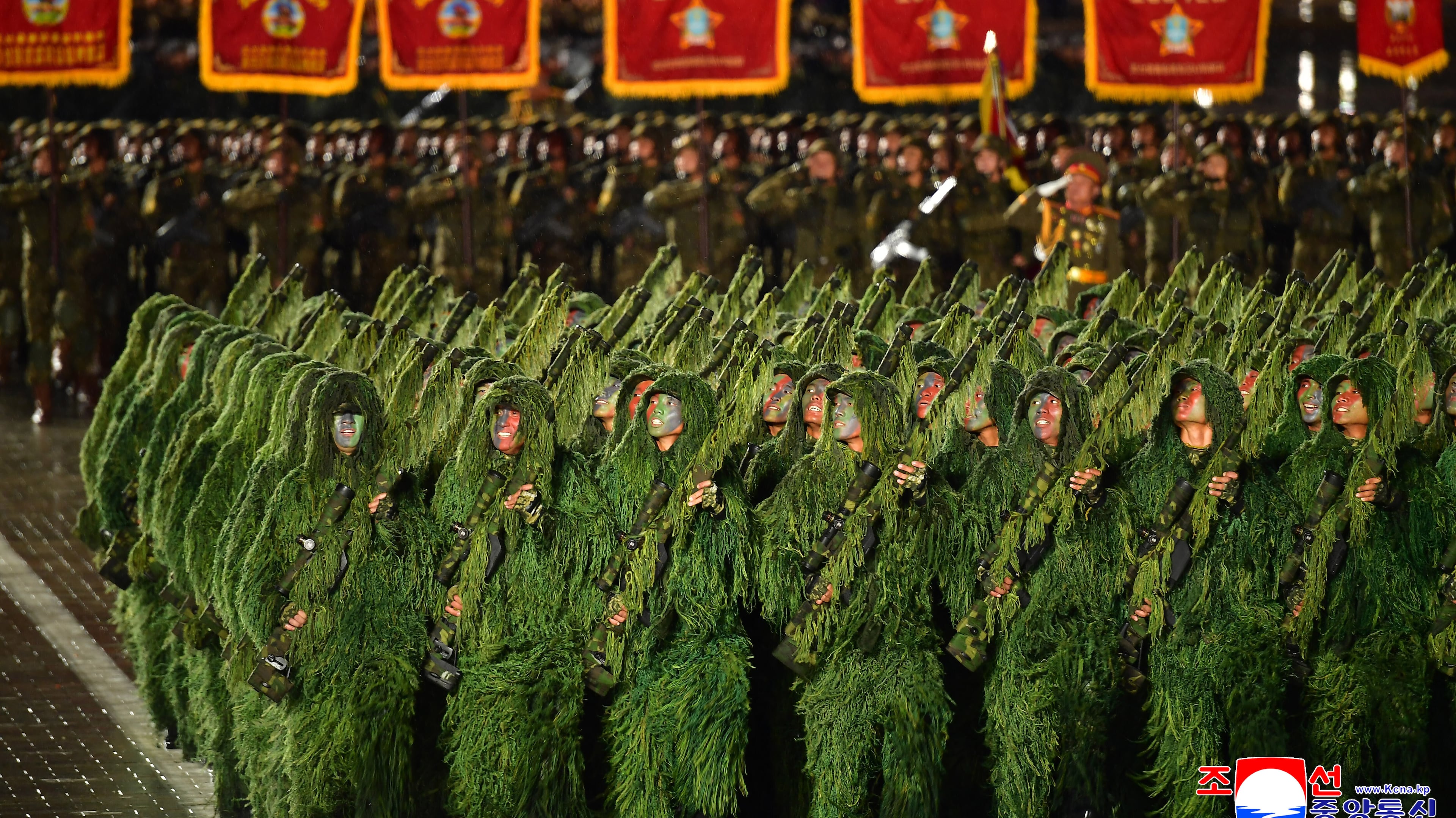 In this photo provided by North Korean government, soldiers march during the military parade marking the 80th anniversary of the founding of the ruling Worker's Party, in Pyongyang, North Korea, Friday, Oct. 10, 2025. Independent journalists were not given access to cover the event depicted in this image distributed by the North Korean government. The content of this image is as provided and cannot be independently verified. Korean language watermark on image as provided by source reads: "KCNA" which is the abbreviation for Korean Central News Agency. (Korean Central News Agency/Korea News Service via AP)