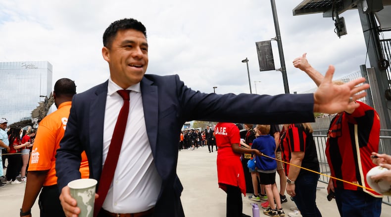 Atlanta United’s coach Gonzalo Pineda greets fans upon the team’s arrival at Mercedes-Benz Stadium on Sunday, March 31, 2024.  Miguel Martinez / miguel.martinezjimenez@ajc.com