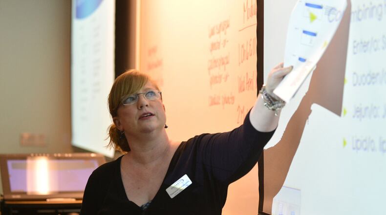 Adjunct professor Stephanie Phillips teaches a medical terminology class at Gwinnett Technical College Monday, April 7, 2014. Phillips is one of a large number of adjunct professors who could be impacted by new rules put in place due to the Affordable Care Act.