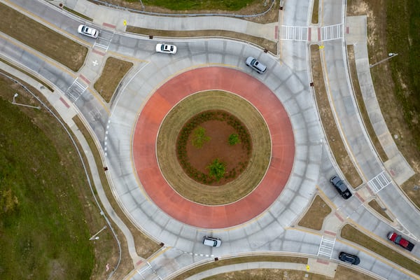 Cars negotiate a roundabout just off I-95 in Bryan County on Tuesday, April 28, 2026. (Ben Gray for the AJC)