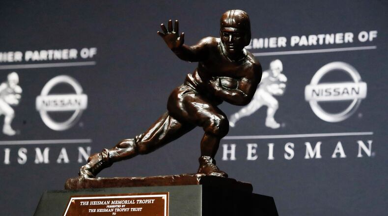 The Heisman Trophy for the 2020 college football season will be awarded on Jan. 5, 2021, from the ESPN studios in Bristol, Conn. (Jason Szenes/AP)