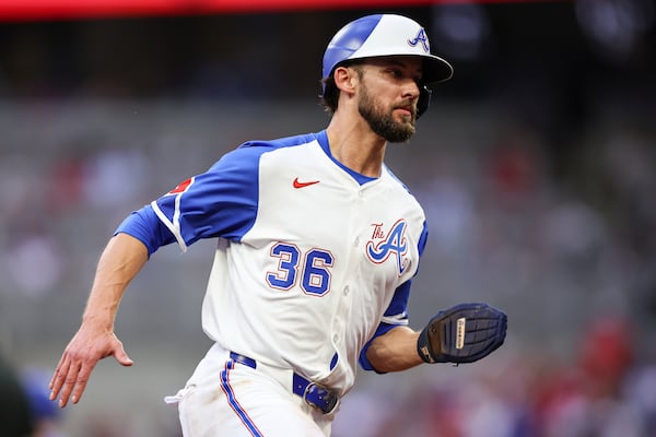 Atlanta Braves' Eli White (36) rounds third base before scoring a run in the second inning of a baseball game against the Philadelphia Phillies, Saturday, June 28, 2025, in Atlanta. (AP Photo/Colin Hubbard)