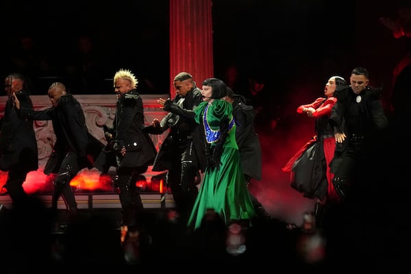 Lady Gaga, center, performs during her free concert on Copacabana Beach in Rio de Janeiro, Saturday, May 3, 2025. (AP Photo/Silvia Izquierdo)