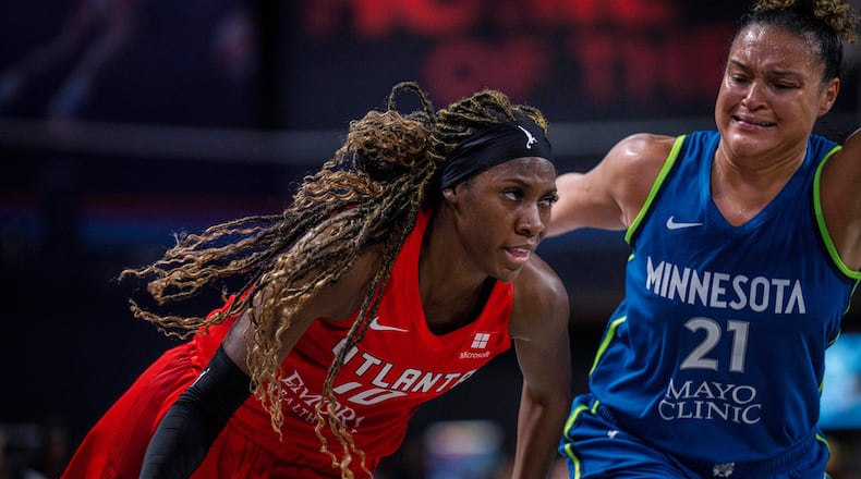 Rhyne Howard (left) scored 22 Saturday for the Dream. AP file photo