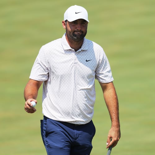 Scottie Scheffler reacts after his shot on the ninth green during the final round of the 3M Open golf tournament at the Tournament Players Club Sunday, July 26, 2026, in Blaine, Minn. (AP Photo/Bailey Hillesheim)