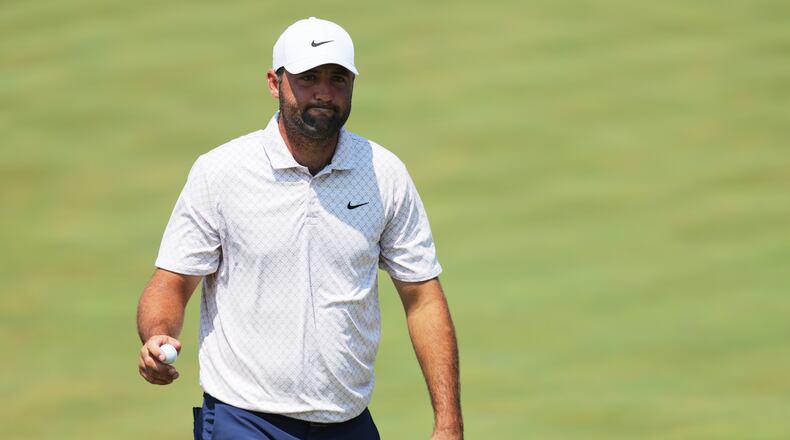Scottie Scheffler reacts after his shot on the ninth green during the final round of the 3M Open golf tournament at the Tournament Players Club Sunday, July 26, 2026, in Blaine, Minn. (AP Photo/Bailey Hillesheim)