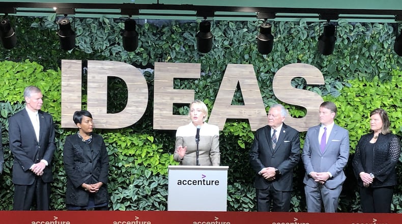 Julie Sweet, center, North American CEO for Accenture, speaks Wednesday, December 12, 2018, before a formal ribbon cutting for the global consulting group’s new technology hub at Technology Square in Midtown. Standing from left to right are Georgia Tech President Bud Peterson, Atlanta Mayor Keisha Lance Bottoms, Gov. Nathan Deal and state Department of Economic Development Commissioner Pat Wilson. J. SCOTT TRUBEY/STRUBEY@AJC.COM.