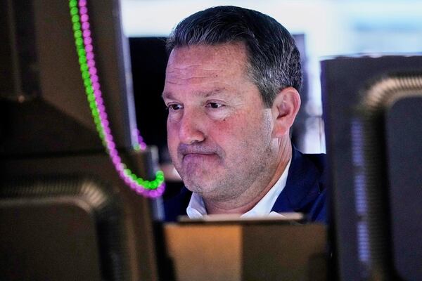 Trader Leon Montana works on the floor of the New York Stock Exchange, Wednesday, April 16, 2025. (AP Photo/Richard Drew)