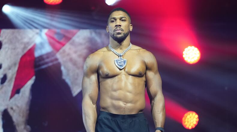 Anthony Joshua is introduced during a weigh-in ahead of his heavyweight boxing match against Jake Paul, Thursday, Dec. 18, 2025, in Miami Beach, Fla. (AP Photo/Lynne Sladky)